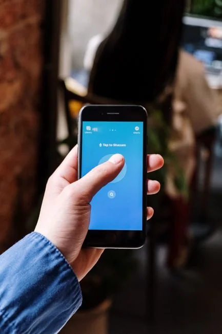 home-img A sleek smartphone displaying artwork in a minimalist setting, perfect for tech and design themes.